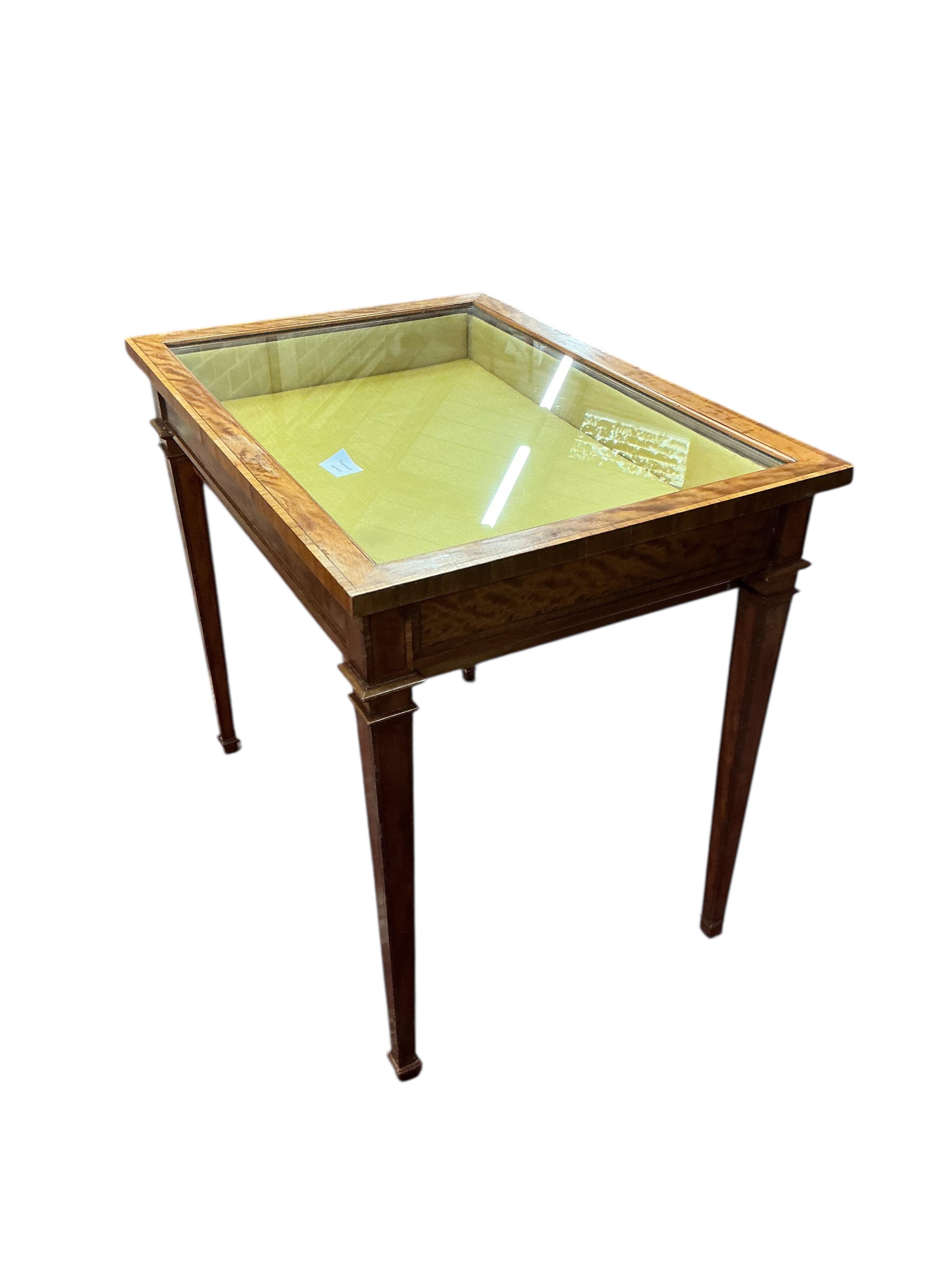 An Edwardian style rectangular satinwood bijouterie table, width 79cm, depth 56cm, height 70cm